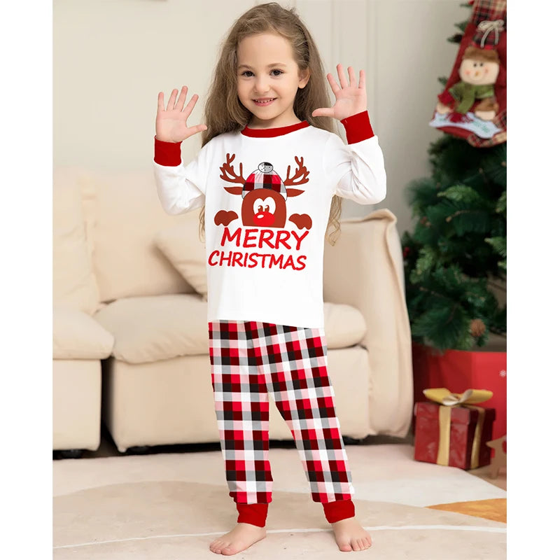 Matching holiday pyjamas with red plaid pattern