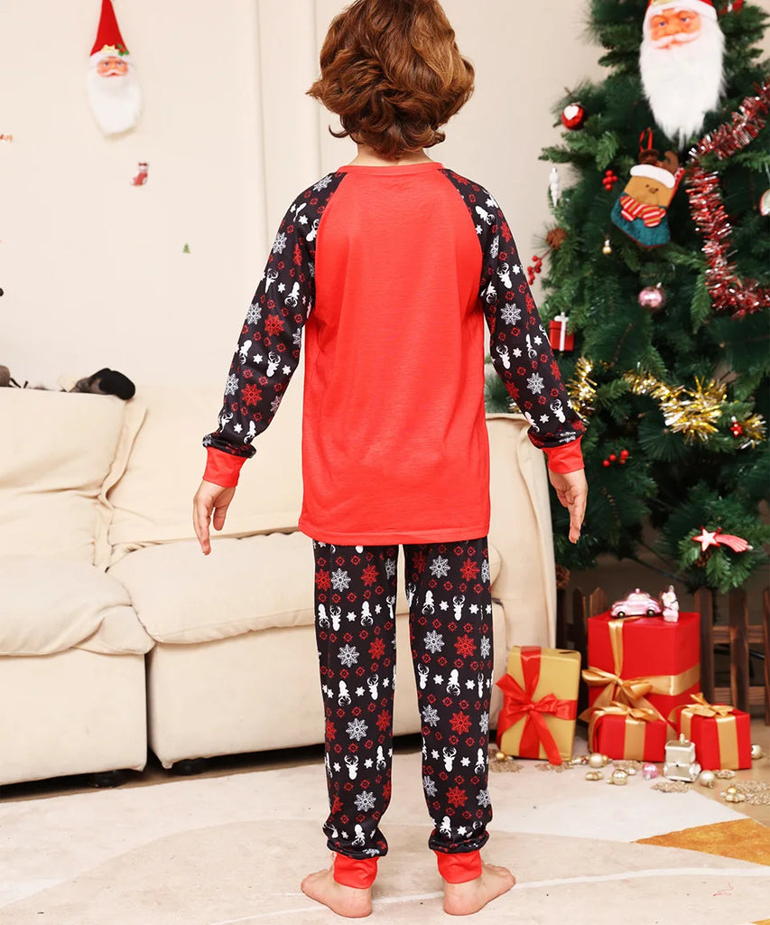 Back of son wearing Oh Deer matching pyjamas