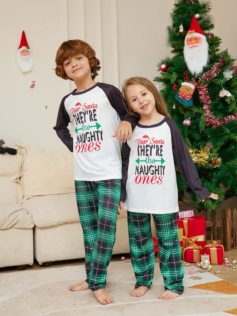 Soft and cosy pyjamas featuring a Naughty or Nice design, perfect for Christmas morning.