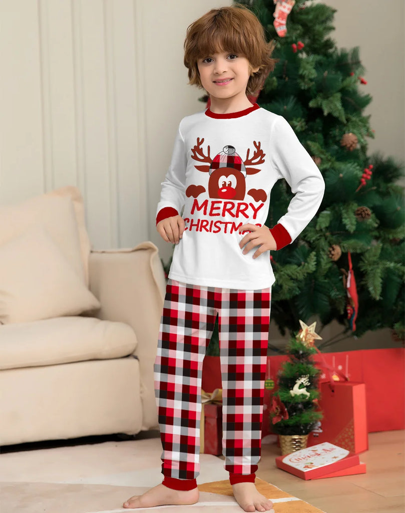 Matching red plaid pyjamas for Christmas family fun