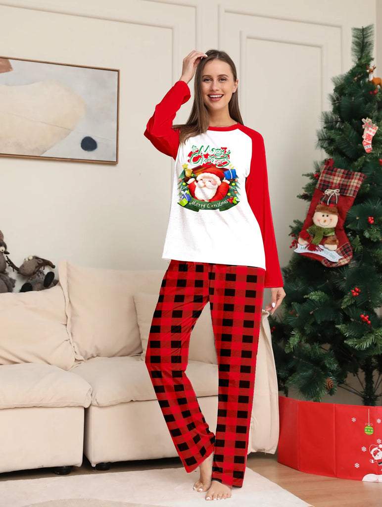 Matching Christmas pyjamas with Santa for family fun
