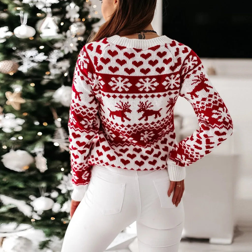 Festive Women’s Christmas jumper featuring reindeer in red & white knit